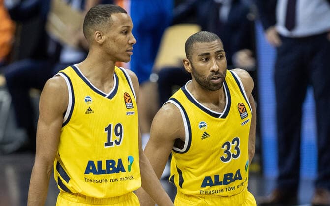 Basketball Euroleague, Alba Berlin Valencia Basket, Main Round, 33 Matchday, Mercedes Benz Arena ALBAs Louis Olinde l and Jayson Granger stand together on the court ALBA Berlin Valencia Basket