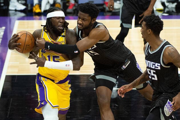 April 2, 2021, Sacramento, CA, USA: Los Angeles Lakers center Montrezl Harrell (15) battles Sacramento Kings forward Chimezie Metu (25) in the first quarter during a game at Golden 1 Center on Friday, April 2, 2021 in Sacramento. Sacramento USA - ZUMAj89_ 20210402_zaf_j89_007 Copyright: xPaulxKitagakixJr.x