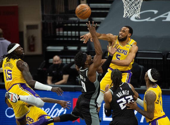 April 2, 2021, Sacramento, CA, USA: Sacramento Kings Terrance Davis battles Los Angeles Lakers guard Talen Horton-Tucker (5) in the second quarter during a game at Golden 1 Center on Friday, April 2, 2021 in Sacramento. Sacramento USA - ZUMAj89_ 20210402_zaf_j89_009 Copyright: xPaulxKitagakixJr.x