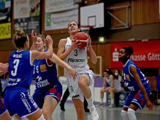 GSD zje123 1 Womens Basketball Bundesliga Flippo Baskets BG 74 BC Pharmaserv Marburg Göttingens Ivana Blazevic on the ball against Marburgs Alexandra Wilke left , Maria Angelina Sola and Tonisha Baker right