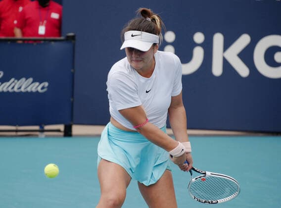 Bianca Vanessa Andreescu from Canada returns the ball to Ashleigh Barty from Australia in the second set Ashleigh Barty from Australiain the women s finals at the Miami Open at Hard Rock Stadium in Miami Gardens, Florida on Saturday, April 3, 2021. Barty won 6-3, 4-0, Ret.  MIA20210403120 GARYxIxROTHSTEIN