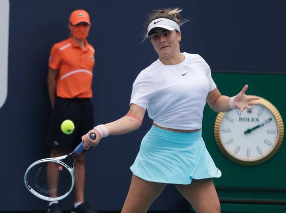 Bianca Vanessa Andreescu from Canada returns the ball to Ashleigh Barty from Australia in the second set Ashleigh Barty from Australia in the women s finals at the Miami Open at Hard Rock Stadium in Miami Gardens, Florida on Saturday, April 3, 2021. Barty won 6-3, 4-0, Ret.  MIA20210403131 GARYxIxROTHSTEIN