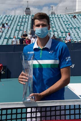 MIAMI GARDENS, FL - APRIL 04: Hubert Hurkacz (POL) holds the tournament trophy after wining the menÕs final of the Miami Open on April 4, 2021, at Hard Rock Stadium in Miami Gardens, Florida (Photo by Michele Eve Sandberg Icon Sportswire) TENNIS: APR 04 Miami Open Icon2104041372