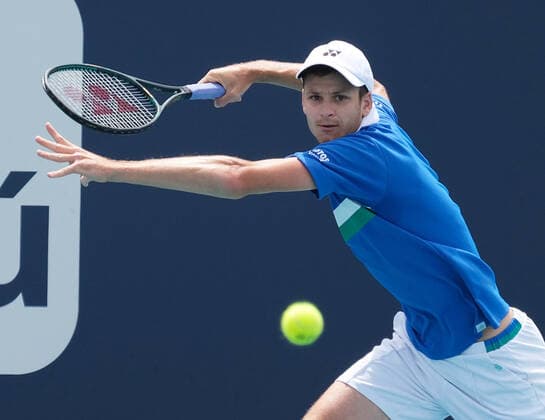 Hubert Hurkacz from Poland hits a running forehand before defeating Jannik Sinner from Italy in the men s finals at the Miami Open in Hard Rock Stadium in Miami Gardens, Florida on Sunday, April 4, 2021. Hurkacz defeated 7-6, (7-4) 6-4.  MIA2021040442 GARYxIxROTHSTEIN