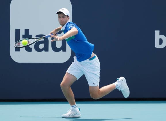Hubert Hurkacz from Poland hits a running forehand before defeating Jannik Sinner from Italy in the men s finals at the Miami Open in Hard Rock Stadium in Miami Gardens, Florida on Sunday, April 4, 2021. Hurkacz defeated 7-6, (7-4) 6-4.  MIA2021040443 GARYxIxROTHSTEIN