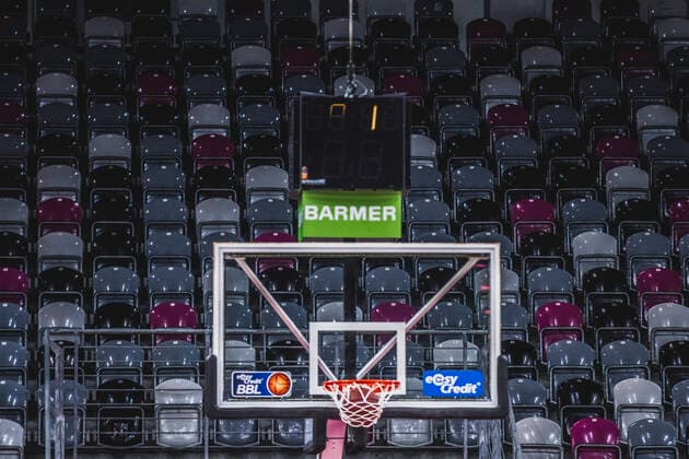 Bonn, 04 04 21 Empty grandstand and the basketball lands in the basketball hoop in the basketball Bundesliga match Telekom Baskets Bonn vs Alba Berlin
