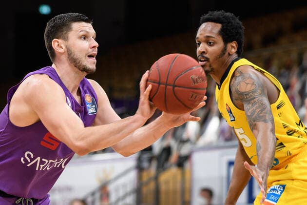 BG Göttingen MHP Riesen Ludwigsburg 05 04 2021, Basketball Bundesliga easyCredit BBL, 2020 2021 season, main round, BG Göttingen MHP Riesen Ludwigsburg Göttingens Rihards Lomazs l plays against Ludwigsburgs Barry Brown Jr Göttingen Lower Saxony Germany.