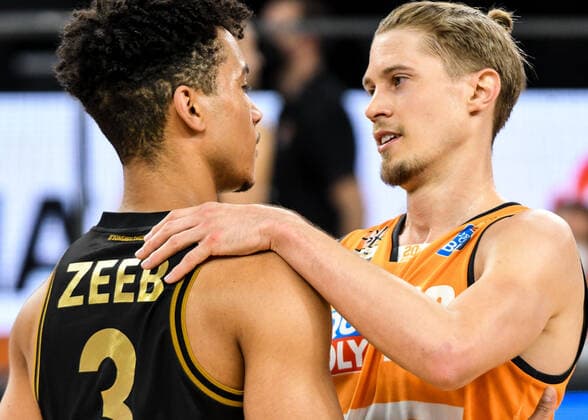 GER, BBL, ratiopharm ulm vs Basketball Löwen Loewen Braunschweig 05 04 2021, ratiopharm arena, Neu Ulm, GER, BBL, ratiopharm ulm vs Basketball Löwen Loewen Braunschweig, in picture Garai Zeeb Braunschweig, 3 and Thomas Klepeisz Ulm, 22 after end of game nordphotoxGmbHx xHafner nph00200