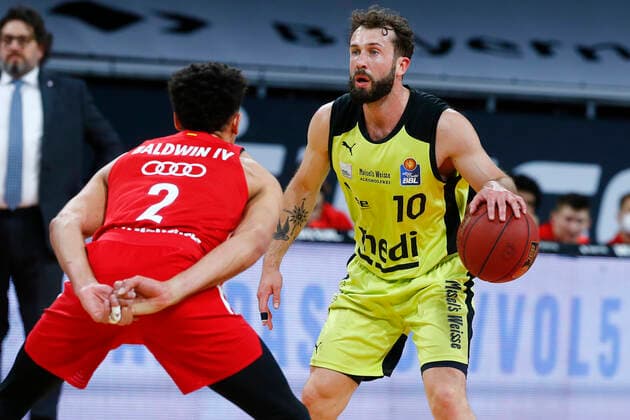 29 Matchday of the easyCredit BBL Basketball Bundesliga on 06 April 2021at the Audi Dome in Munich Bavaria Germany Season 2020 2021 FC Bayern München vs Medi Bayreuth Wade Baldwin FC Bayern München 2 left Bastian Doreth Medi Bayreuth 10 right