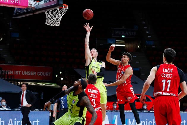 29 Matchday of the easyCredit BBL Basketball Bundesliga on 06 April 2021at the Audi Dome in Munich Bavaria Germany Season 2020 2021 FC Bayern München vs Medi Bayreuth Wade Baldwin FC Bayern München 2 right Osvaldas Olisevicius Medi Bayreuth 31 left