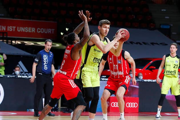 29 Matchday of the easyCredit BBL Basketball Bundesliga on 06 April 2021at the Audi Dome in Munich Bavaria Germany Season 2020 2021 FC Bayern München vs Medi Bayreuth Jalen Reynolds FC Bayern München 8 left Andreas Seiferth Medi Bayreuth 11 right