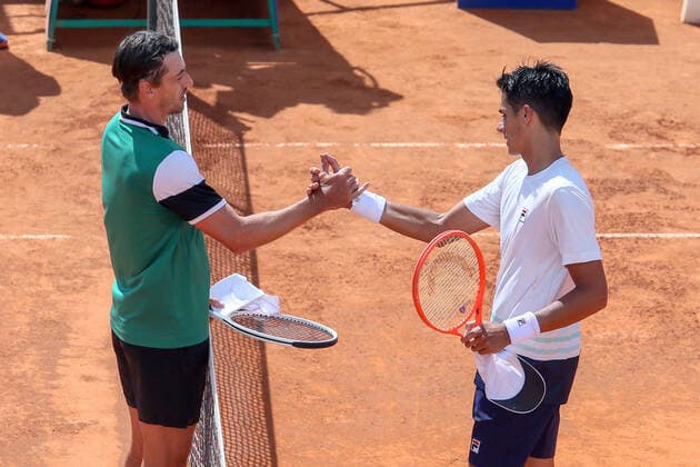 2021 Sardegna Open Tennis - 20210406 CAGLIARI, ITALY, APR 06: Federico Coria greets John Millman after their ATP, Tennis Herren Tour 250 Sardegna Open tennis match in Cagliari, Italy on April 06, 2021. Cagliari Tennis Club Cagliari Italy 6463_236791 Copyright: xGiampieroxSposito PentaxPressx