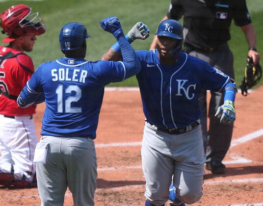 Kansas City Royals Salvador Perez (13) celebrates with Jorge Soler (12) after hitting a solo home run in the fourth inning against the Cleveland Indians at Progressive Field in Cleveland, Ohio on Wednesday, April 7, 2021.  CLE20210407109 AARONxJOSEFCZYK