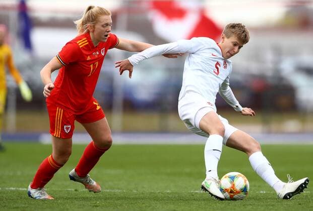 Mandatory Credit: Photo by Kieran McManus BPI Shutterstock (11850238h) Ceri Holland of Wales and Quinn of Canada in action Wales Women v Canada Women, International Friendly, Länderspiel, Nationalmannschaft Football, The Leckwith Athletics Stadium, Cardiff, UK - 9 Apr 2021 EDITORIAL USE ONLY No use with unauthorised audio, video, data, fixture lists, club league logos or live services. Online in-match use limited to 120 images, no video emulation. No use in betting, games or single club league player publications. Wales Women v Canada Women, International Friendly, Football, The Leckwith Athletics Stadium, Cardiff, UK - 9 Apr 2021 EDITORIAL USE ONLY No use with unauthorised audio, video, data, fixture lists, club league logos or live services. Online in-match use limited to 120 images, no video emulation. No use in betting, games or single club league player publications. Copyright: xKieranxMcManus BPI Shutterstockx 11850238h