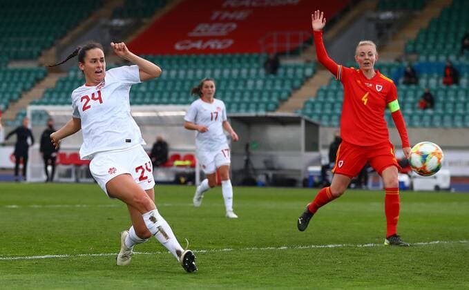 Mandatory Credit: Photo by Kieran McManus BPI Shutterstock (11850238r) Evelyne Viens of Canada scores a goal to make the score 0-2 Wales Women v Canada Women, International Friendly, Länderspiel, Nationalmannschaft Football, The Leckwith Athletics Stadium, Cardiff, UK - 9 Apr 2021 EDITORIAL USE ONLY No use with unauthorised audio, video, data, fixture lists, club league logos or live services. Online in-match use limited to 120 images, no video emulation. No use in betting, games or single club league player publications. Wales Women v Canada Women, International Friendly, Football, The Leckwith Athletics Stadium, Cardiff, UK - 9 Apr 2021 EDITORIAL USE ONLY No use with unauthorised audio, video, data, fixture lists, club league logos or live services. Online in-match use limited to 120 images, no video emulation. No use in betting, games or single club league player publications. Copyright: xKieranxMcManus BPI Shutterstockx 11850238r