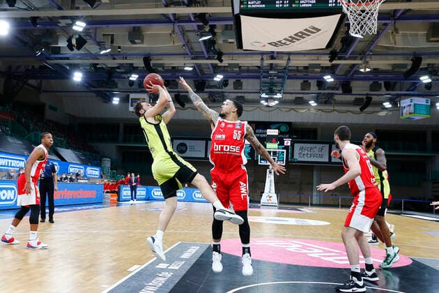 27 Matchday of the easyCredit BBL Basketball Bundesliga on 10 April 2021at the Oberfrankenhalle in Bayreuth Bavaria Germany Season 2020 2021 Medi Bayreuth vs Brose Bamberg Bastian Doreth Medi Bayreuth 10 left Tyler Larson Brose Bamberg 55 right