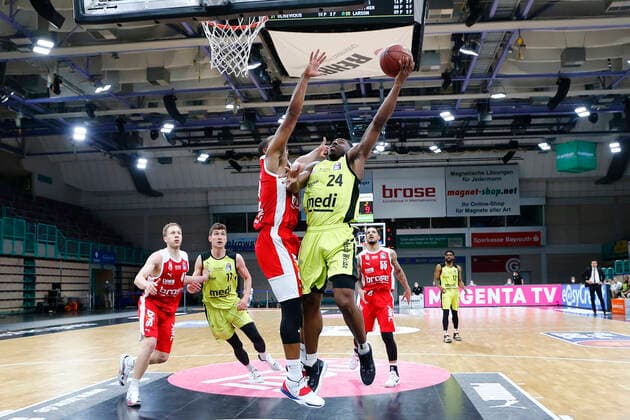 27 Matchday of the easyCredit BBL Basketball Bundesliga on 10 April 2021at the Oberfrankenhalle in Bayreuth Bavaria Germany Season 2020 2021 Medi Bayreuth vs Brose Bamberg Frank Bartley Medi Bayreuth 24 right Devon Hall Brose Bamberg 22 left