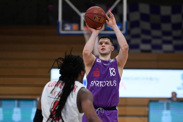 BG Göttingen S Oliver Baskets Würzburg 11 04 2021, Basketball Bundesliga easyCredit BBL, 2020 2021 season, main round, BG Göttingen S Oliver Baskets Würzburg Göttingens Rihards Lomazs r plays against Würzburgs Robert Loewery Göttingen Lower Saxony Germany.