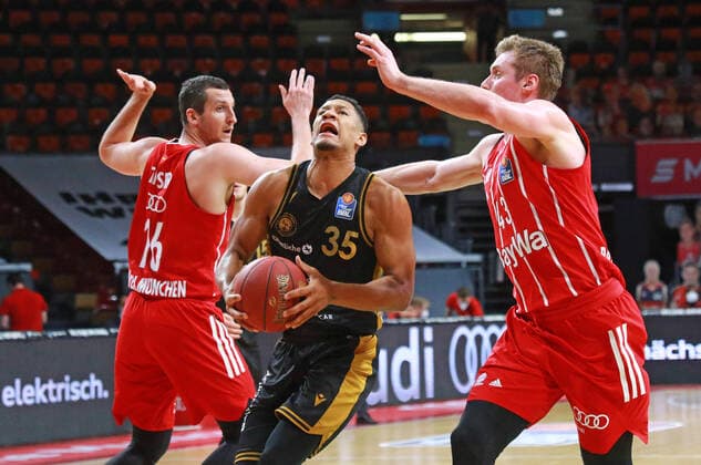 43 Leon Radosevic and 16 Paul Zipser FCBB red, against 35 Karim Jallow Braunschweig basketball, 1 Bundesliga, BBL, FC Bayern Munich, Basketball Loewen Braunschweig at Audi Dome, 11 04 2021 PHOTO Mladen Lackovic LakoPress