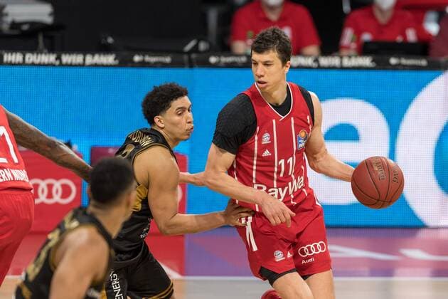 Basketball, BBL, 20210411, FC Bayern München Basketball Löwen Braunschweig Pictured James ROBINSON Basketball Löwen Braunschweig, 8 and Vladimir LUCIC FC Bayern München, 11 Munich Audi Dome Bayern Germany Copyright: Passion2Press MarkusxFischerx