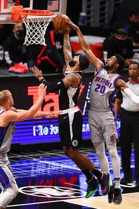 LOS ANGELES, CA - APRIL 11: Detroit Pistons Guard Josh Jackson (20) blocks Los Angeles Clippers Guard Paul George (13) shot during a NBA, Basketball Herren, USA game between the Detroit Pistons and the Los Angeles Clippers on April 11, 2021 at STAPLES Center in Los Angeles, CA. (Photo by Brian Rothmuller Icon Sportswire) NBA: APR 11 Pistons at Clippers Icon210411007
