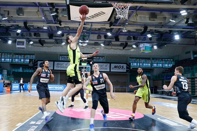 28 Matchday of the easyCredit BBL Basketball Bundesliga on 13 April 2021at the Oberfrankenhalle in Bayreuth Bavaria Germany season 2020 2021 Medi Bayreuth vs ratiopharm Ulm Bastian Doreth Medi Bayreuth 10 left Dylan Osetkowski ratiopharm Ulm 21 right