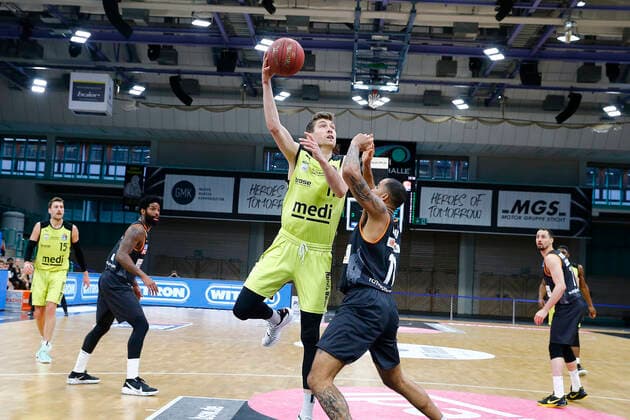 28 Matchday of the easyCredit BBL Basketball Bundesliga on 13 April 2021at the Oberfrankenhalle in Bayreuth Bavaria Germany season 2020 2021 Medi Bayreuth vs ratiopharm Ulm Andreas Seiferth Medi Bayreuth 11 left Isaiah Wilkins ratiopharm Ulm 11 right
