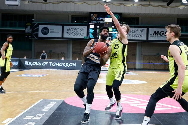 28 Matchday of the easyCredit BBL Basketball Bundesliga on 13 April 2021at the Oberfrankenhalle in Bayreuth Bavaria Germany season 2020 2021 Medi Bayreuth vs ratiopharm Ulm David Walker Medi Bayreuth23 right Cameron Clark ratiopharm Ulm 3 left