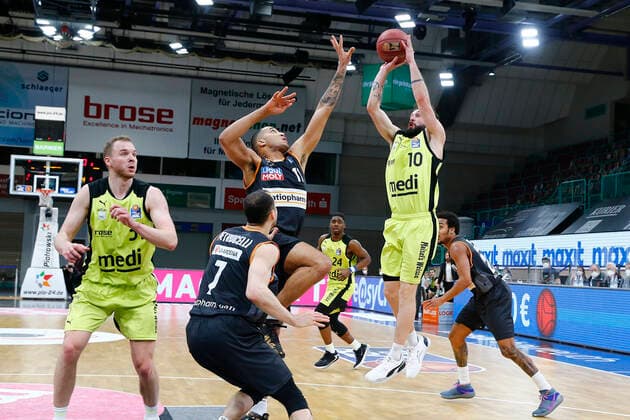 28 Matchday of the easyCredit BBL Basketball Bundesliga on 13 April 2021at the Oberfrankenhalle in Bayreuth Bavaria Germany season 2020 2021 Medi Bayreuth vs ratiopharm Ulm Bastian Doreth Medi Bayreuth 10 right Isaiah Wilkins ratiopharm Ulm 11 left