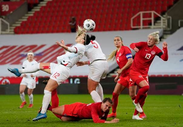Stoke, England, 13th April 2021. Lucy Bronze of England attempts to get a consolation goal near the end during the International Football Friendly match at The Bet365 Stadium, Stoke. Picture credit should read: Andrew Yates Sportimage EDITORIAL USE ONLY. No use with unauthorised audio, video, data, fixture lists, club league logos or live services. Online in-match use limited to 120 images, no video emulation. No use in betting, games or single club league player publications. SPI-0999-0043