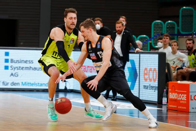 28 Matchday of the easyCredit BBL Basketball Bundesliga on 13 April 2021at the Oberfrankenhalle in Bayreuth Bavaria Germany season 2020 2021 Medi Bayreuth vs ratiopharm Ulm Matthew Tiby Medi Bayreuth 15 left Andreas Obst ratiopharm Ulm 13 right