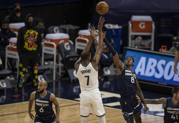 April 13, 2021, Minneapolis, MN, United States: Brooklyn Nets forward Kevin Durant (7) scores over Minnesota Timberwolves forward Jarred Vanderbilt (8) at Target Center on Tuesday, April 13, 2021 in Minneapolis, Minnesota. Minneapolis United States - ZUMAm67_ 0116799639st Copyright: xJerryxHoltx