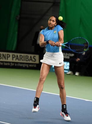 (210417) -- JURMALA, April 17, 2021 -- Karman Kaur Thandi of India competes against Anastasija Sevastova of Latvia during the Billie Jean King Cup by BNP Paribas play-offs between Latvia and India at the National Tennis Centre Lielupe in Jurmala, Latvia on April 16, 2021. (Photo by Xinhua) (SP)LATVIA-JURMALA-TENNIS-BILLIE JEAN KING CUP-PLAY-OFFS-LATVIA VS INDIA EdijsxPalens 