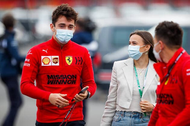 LECLERC Charles (mco), Scuderia Ferrari SF21, with his girlfriend SINE Charlotte during the Formula 1 Pirelli Gran Premio Del Made In Italy E Dell Emilia Romagna 2021 from April 16 to 18, 2021 on the Autodromo Internazionale Enzo e Dino Ferrari, in Imola, Italy - FORMULE 1 : Grand prix Emilie Romagne - Imola - Essais - 17 04 2021 DPPI Panoramic 