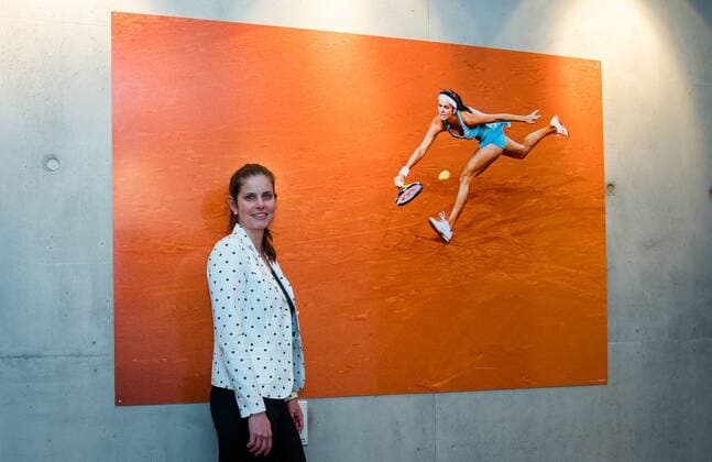 Mandatory Credit: Photo by Rob Prange Shutterstock (11862863aa) Julia Goerges of Germany poses in front of a photo commemorating her 2011 championship run at the 2021 Porsche Tennis Grand Prix WTA, Tennis Damen 500 tournament 2021 Porsche Tennis Grand Prix Qualifications Day 1 - 17 Apr 2021 2021 Porsche Tennis Grand Prix Qualifications Day 1 - 17 Apr 2021  Copyright: xRobxPrange Shutterstockx 11862863aa