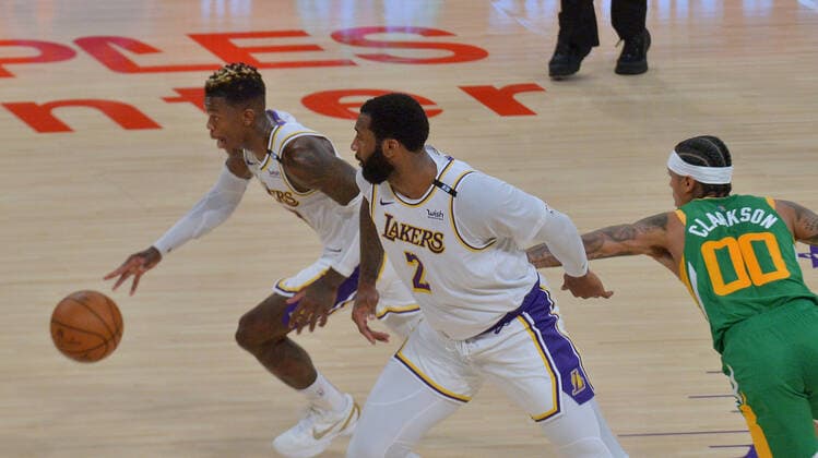Los Angeles Lakers point guard Dennis Schroder steals the ball from Utah Jazz guard Jordan Clarkson during the second half at Staples Center in Los Angeles on Saturday, April 17, 2021. The Lakers won with a 127-115 overtime defeat of the first-place Jazz.  LAP2021041711 JIMxRUYMEN