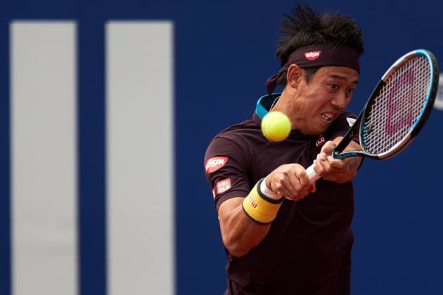 Japanese tennis player Kei Nishikori returns the ball to Argentinian Guido Pella during the Barcelona Open Banc Sabadell tennis tournament at Real Club de Tenis in Barcelona, Catalonia, Spain, 19 April 2021. Barcelona Open Banc Sabadell tennis tournament: Kei Nishikori vs Guido Pella !ACHTUNG: NUR REDAKTIONELLE NUTZUNG!  Copyright: xAlejandroxGarciax GRAFCAT1576 20210419-637544530639435752