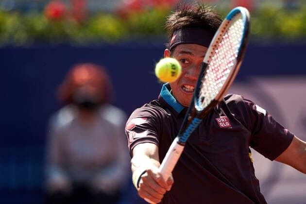 Japanese tennis player Kei Nishikori returns the ball to Argentinian Guido Pella during the Barcelona Open Banc Sabadell tennis tournament at Real Club de Tenis in Barcelona, Catalonia, Spain, 19 April 2021. Barcelona Open Banc Sabadell tennis tournament: Kei Nishikori vs Guido Pella !ACHTUNG: NUR REDAKTIONELLE NUTZUNG!  Copyright: xAlejandroxGarciax GRAFCAT1582 20210419-637544531251349472