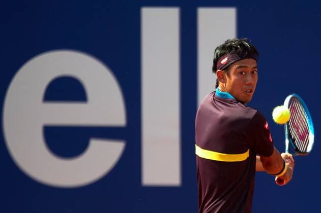 Japanese tennis player Kei Nishikori returns the ball to Argentinian Guido Pella during the Barcelona Open Banc Sabadell tennis tournament at Real Club de Tenis in Barcelona, Catalonia, Spain, 19 April 2021. Barcelona Open Banc Sabadell tennis tournament: Kei Nishikori vs Guido Pella !ACHTUNG: NUR REDAKTIONELLE NUTZUNG!  Copyright: xAlejandroxGarciax GRAFCAT1578 20210419-637544531261349587