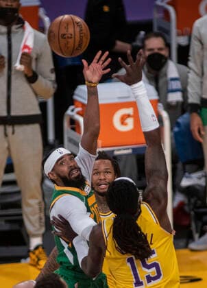 April 19, 2021, Los Angeles, California, USA: Montrezl Harrell 15 of the Los Angeles Lakers is unable to block a pass by Mike Conley 10 of the Utah Jazz during their regular season NBA, Basketball Herren, USA game on Monday April 19, 2021 at the Staples Center in Los Angeles, California. Lakers lose to Jazz, 97-111. PI Los Angeles USA - ZUMAp124 20210419_zaa_p124_046 Copyright: xJAVIERxROJASx