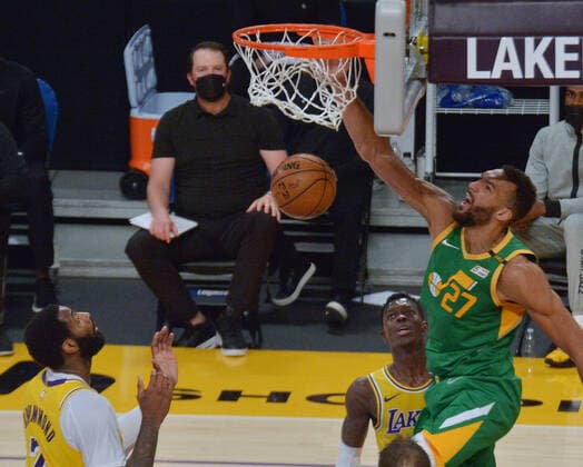 Utah Jazz center Rudy Gobert (27) jams on Los Angeles Lakers center Andre Drummond (2) during the second half of their NBA, Basketball Herren, USA game at Staples Center in Los Angeles on Monday, April 19, 2021. The Jazz defeated the Lakers 111-97.  LAP2021041911 JIMxRUYMEN