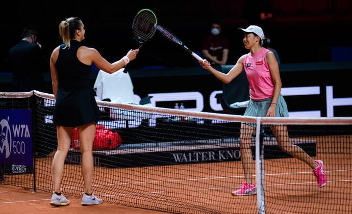 April 20, 2021, STUTTGART, GERMANY: Aryna Sabalenka of Belarus & Shuai Zhang at the net after their first-round match at the 2021 Porsche Tennis Grand Prix WTA, Tennis Damen 500 tournament STUTTGART GERMANY - ZUMAa181 20210420_zaa_a181_161 Copyright: xRobxPrangex