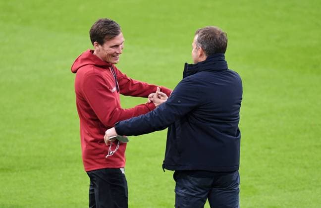 Football 1 Bundesliga Season 20 21 FC Bayern Muenchen Bayer 04 Leverkusen Football 1 Bundesliga Season 2020 2021 30 Matchday FC Bayern Muenchen Bayer 04 Leverkusen 20 04 2021 Coach Hansi Flick r, FC Bayern Muenchen welcomes coach Hannes Wolf li, Bayer 04 Leverkusen before the match PHOTO Markus Ulmer Pressefoto Ulmer Pool xxNOxMODELxRELEASExx DFL regulations prohibit any use of photographs as image sequences and or quasi video Muenchen Deutschland Poolfoto Ulmer Pool ,EDITORIAL USE ONLY