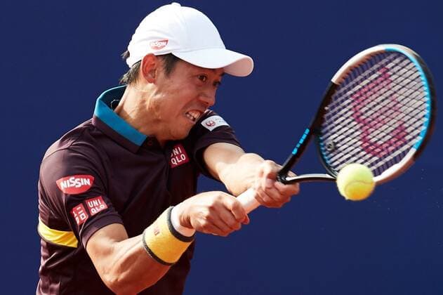 Japanese tennis player Kei Nishikori in action against Spanish tennis player Rafael Nadal during the Barcelona Open Banc Sabadell - Conde de Godo tournament round of 16 tennis match in Barcelona, Spain, 22 April 2021. Rafael Nadal vs Kei Nishikori !ACHTUNG: NUR REDAKTIONELLE NUTZUNG!  Copyright: xAlejandroxGarcíax GRAFCAT1905 20210422-637547158262378943
