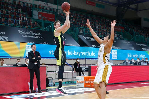 30 Matchday of the easyCredit BBL Basketball Bundesliga on 24 April 2021 at the Oberfrankenhalle in Bayreuth Bavaria Germany Season 2020 2021 Medi Bayreuth vs Basketball Löwen Braunschweig David Walker Medi Bayreuth23 left James Robinson Basketball Löwen Braunschweig 8 right