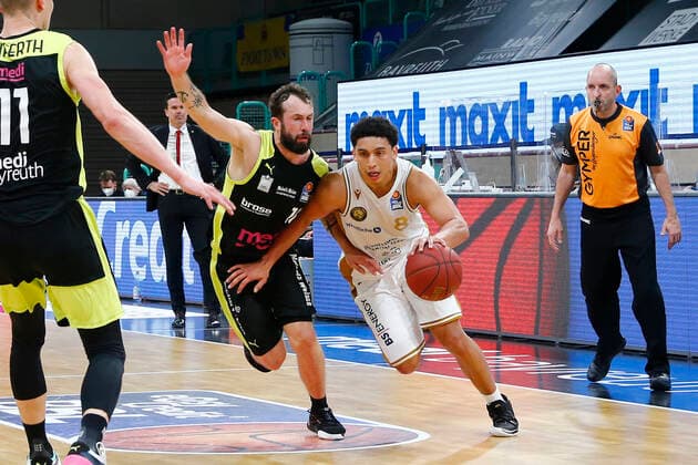 30 Matchday of the easyCredit BBL Basketball Bundesliga on 24 April 2021 at Oberfrankenhalle in Bayreuth Bavaria Germany Season 2020 2021 Medi Bayreuth vs Basketball Löwen Braunschweig Bastian Doreth Medi Bayreuth 10 left James Robinson Basketball Löwen Braunschweig 8 right