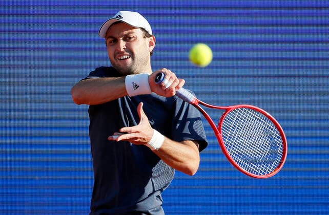 (210425) -- BELGRADE, April 25, 2021 -- Russia s Aslan Karatsev returns a shot during the ATP, Tennis Herren 250 Serbia Open singles semifinal tennis match between Serbia s Novak Djokovic and Russia s Aslan Karatsev in Belgrade, Serbia on April 24, 2021. (Photo by Xinhua) (SP)SERBIA-BELGRADE-TENNIS-ATP SERBIA OPEN-SEMIFINAL PredragxMilosavljevic 