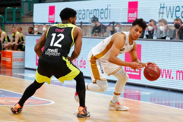 30 Matchday of the easyCredit BBL Basketball Bundesliga on 24 April 2021 at the Oberfrankenhalle in Bayreuth Bavaria Germany Season 2020 2021 Medi Bayreuth vs Basketball Löwen Braunschweig Lazeric Jones Medi Bayreuth 12 left Garai Zeeb Basketball Löwen Braunschweig 3 right