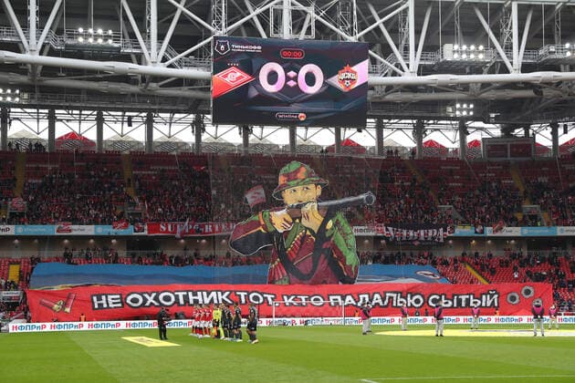 MOSCOW, RUSSIA â€“ APRIL 25, 2021: Spartak Moscow fans unfold a large banner depicting head coach Domenico Tedesco as a hunter and reading A True Hunter Settles For No Carrion during their team s 2020 2021 Russian Premier League Round 27 football match against CSKA Moscow at Otkritie Bank Arena. Sergei Savostyanov TASS  TS0FE0E9
