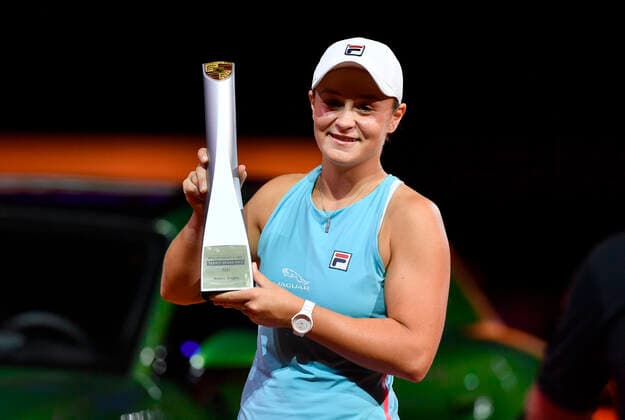 Ashleigh Barty AUS Award ceremony with trophy in front of winning car Porsche Taycan Turbo S Cross Turismo Final Tennis Ladies Porsche Cup Porsche Tennis Grand Prix GP Stuttgart 2021 Porsche Arena 25 04 2021 Porsche Tennis Grand Prix Stuttgart 2021